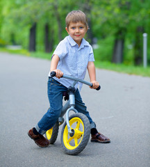 Little boy on a bicycle
