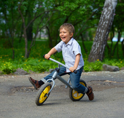 Little boy on a bicycle