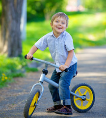 Little boy on a bicycle