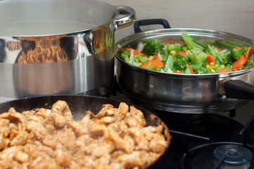 Cooking - kebab, pasta and vegetables