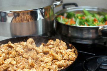 Cooking - kebab, pasta and vegetables