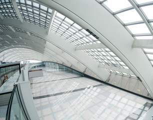 interior of the modern mall of beijin airport subway station.