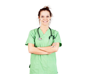 Young woman in green scrubs smiling