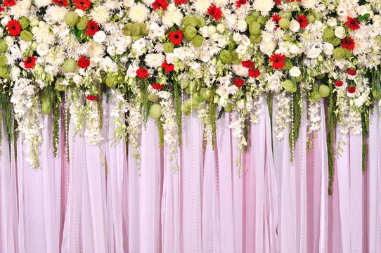 Beautiful Flowers Blossom On Pink Curtain Background For Wedding