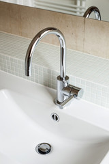 Modern bathroom, sink in white ceramic