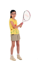 little girl with plays tennis on a white background