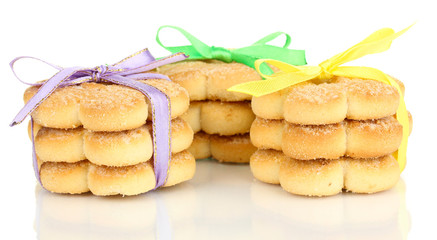 Sweet cookies tied with colorful ribbons isolated on white