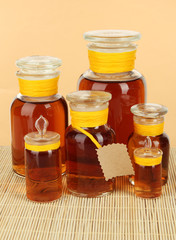 Medicine bottles on beige background