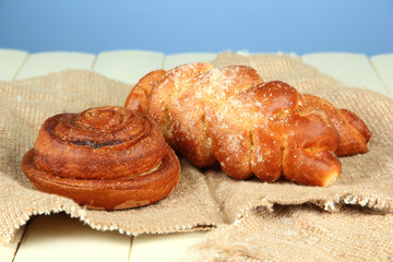 Composition with buns in wicker basket,