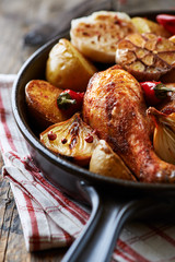 Oven-baked chicken with vegetables 