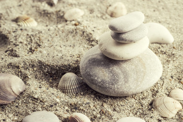 Fototapeta na wymiar Balance stones in sand