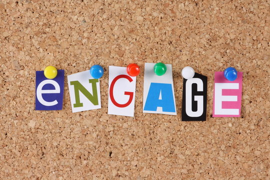 The word Engage in cut out magazine letters