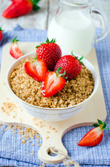 Cereal with strawberries . Breakfast.
