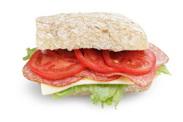 big sandwich with salami cheese tomato bread