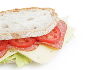 big sandwich with salami and cheese on white bread