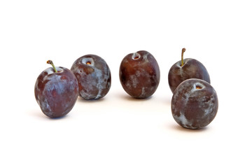 Group of plums isolated on a white