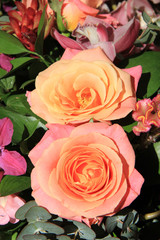 Orchids and roses in bridal bouquet