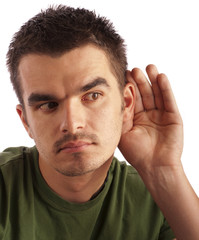 Fototapeta premium Young man eavesdropping