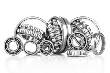Composition of steel ball roller bearings  on white background