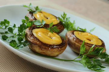 Champignon prepared with cheese and onion