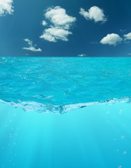 Fototapeta premium blue water and sky with clouds