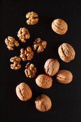 walnuts on black background