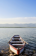 Obraz na płótnie Canvas Empty Boat at Lake