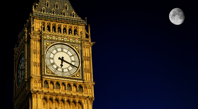 Big Ben at night with full moon, London