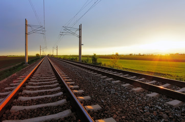 Naklejka na ściany i meble Railway at dusk