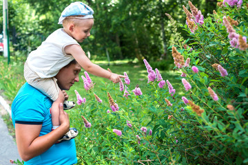 A child reaches for a butterfly