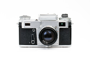 Old photographic camera isolated on white background