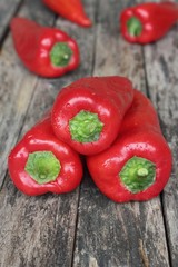 Red peppers on the background