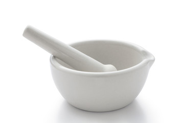 white porcelain mortar and pestle set