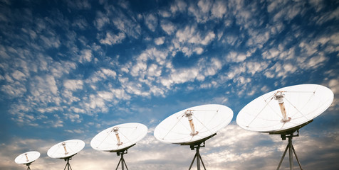 satellite dish antennas under sky