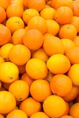 Lots of fresh and ripe oranges.