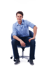 Fototapeta na wymiar Handsome male sitting on chair