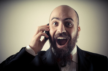  funny happy elegant bearded man on the phone