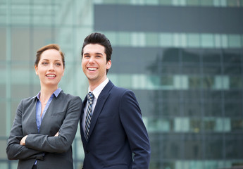 Portrait of a businessman and business woman smiling