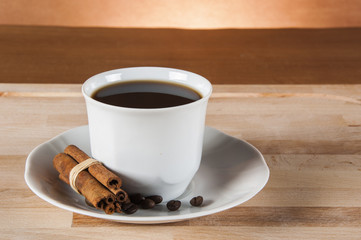 Italian coffee on wooden table with brown background