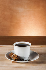 Italian coffee on wooden table with brown background