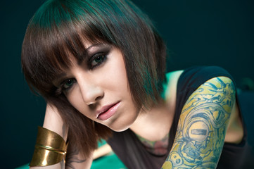 tattooed girl in studio