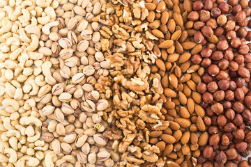 Surface covered with different nuts