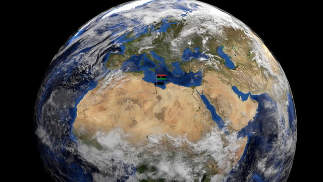 Libya flag on pole on earth globe animation