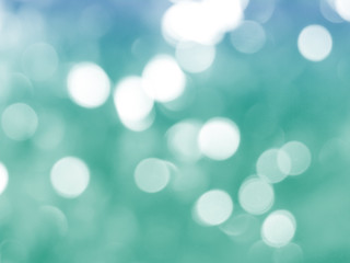 green christmas background with bokeh lights