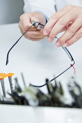 Workshop repair of glasses