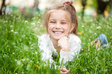 adorable little girl on the meadow