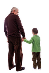 Senior man holding his grandson's hand, back view