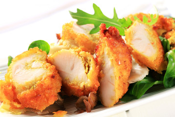 Breaded chicken breast with salad greens