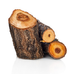 Stack of cut logs fire wood from tree. Renewable resource of a e