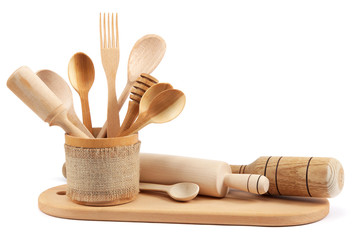 Wooden kitchen utensils isolated on white background.